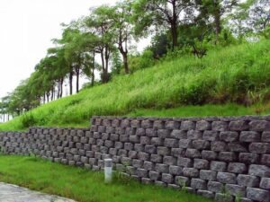 Geogrid reinforced soil retaining wall definition composition construction cost